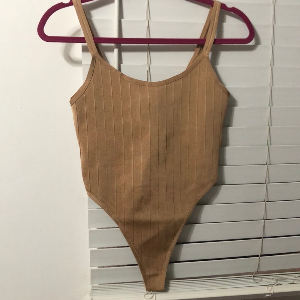 Very thick and nice Gold bodysuit